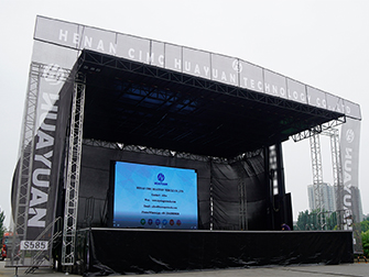 Outdoor concert stage semi trailer with lighting truss and speaker racks